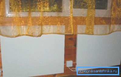 Аматарскае фота, электрычных нагревателей, вырабленых у выглядзе панэляў з керамічнымі ўстаўкамі Аматарскае фота, электрычных нагревателей, вырабленых у выглядзе панэляў з керамічнымі ўстаўкамі